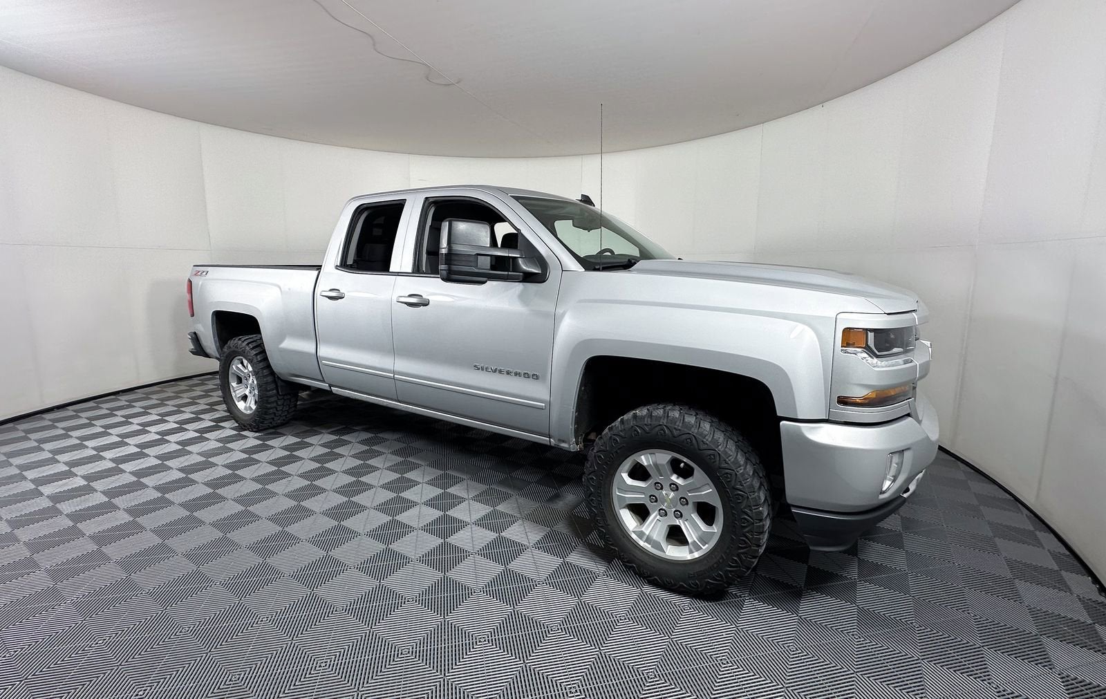 2017 Chevrolet Silverado 1500 LT in Silver Ice Metallic — front three-quarter view